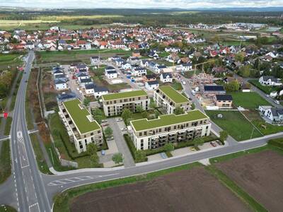 So soll der neue Gebäudekomplex von Schultheißt Projektentwicklung und BayernHeim im Baugebiet Heßdorf Süd mit 92 Wohneinheiten (unten im Bild die Lohestraße) nach der Fertigstellung im Jahr 2026 einmal aussehen. Der Baubeginn ist für August 2024 geplant.