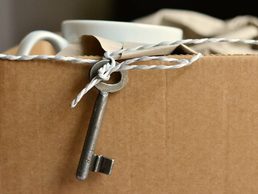Umzug Karton Schlüssel - Symbolbild